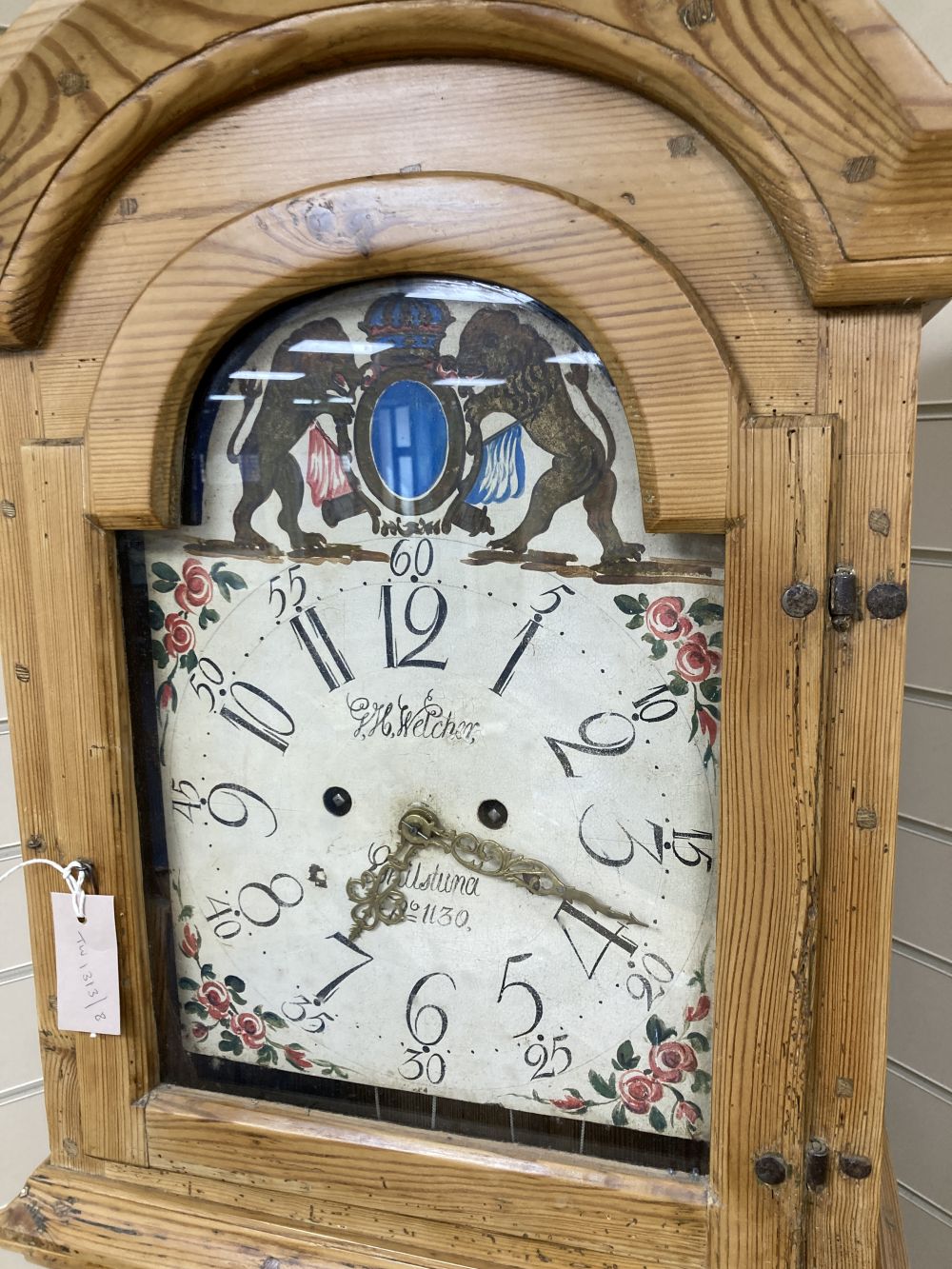 A Swedish pine longcase clock, G H Welcher, Eskilstuna, with painted dial, height 216cm
